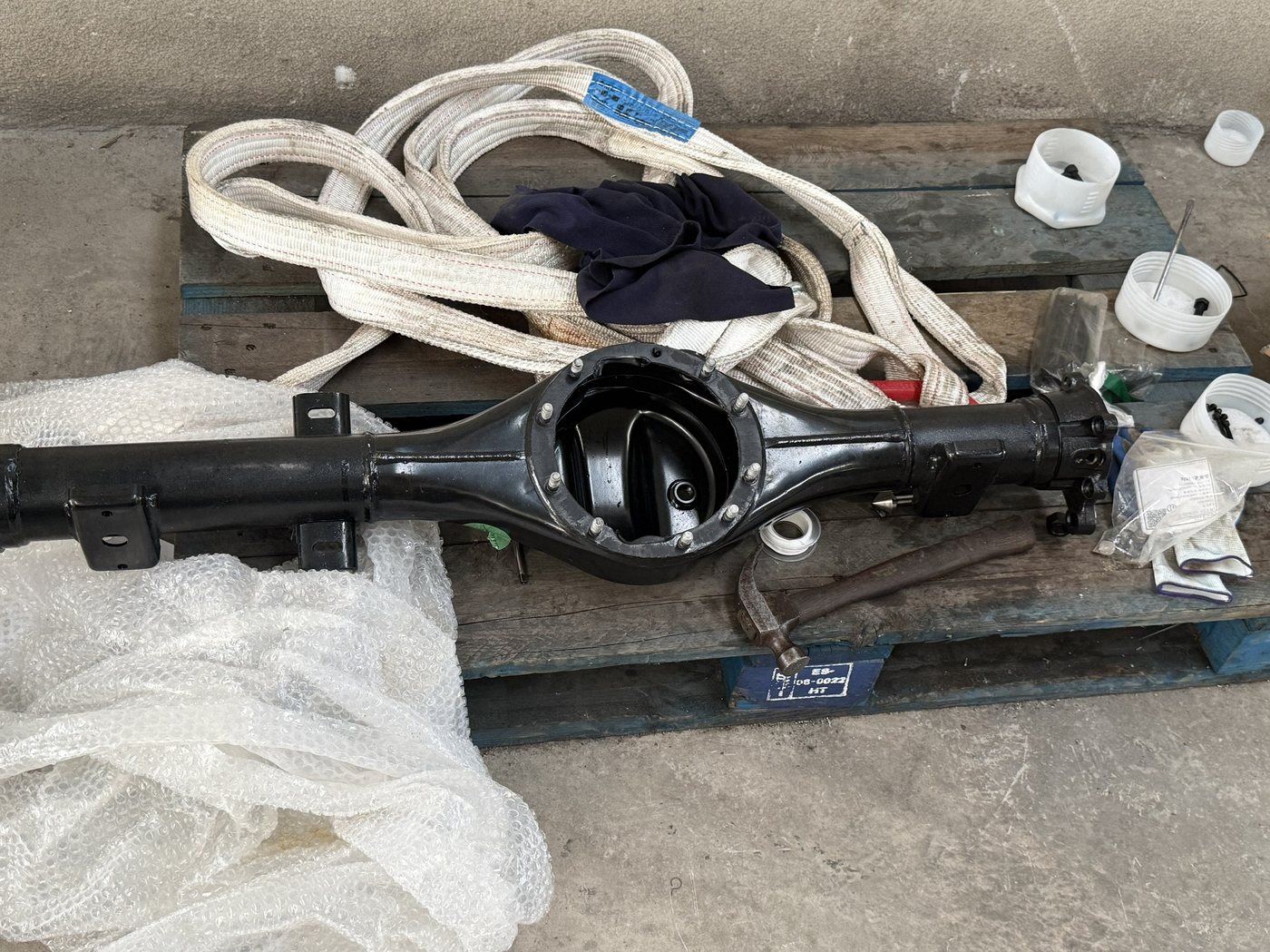 The workpiece as received &mdash; a thin-wall cast housing, roughly 1.4 m overall